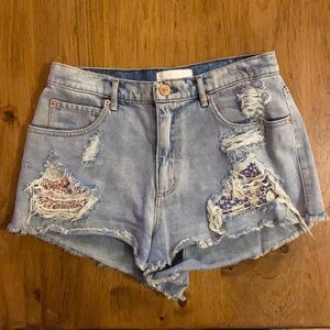 High-waisted denim shorts. Size 7